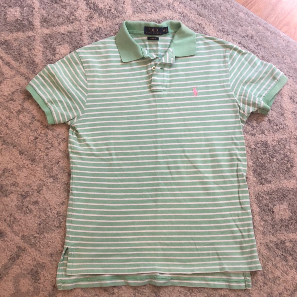 Light, mint green polo. Size medium.